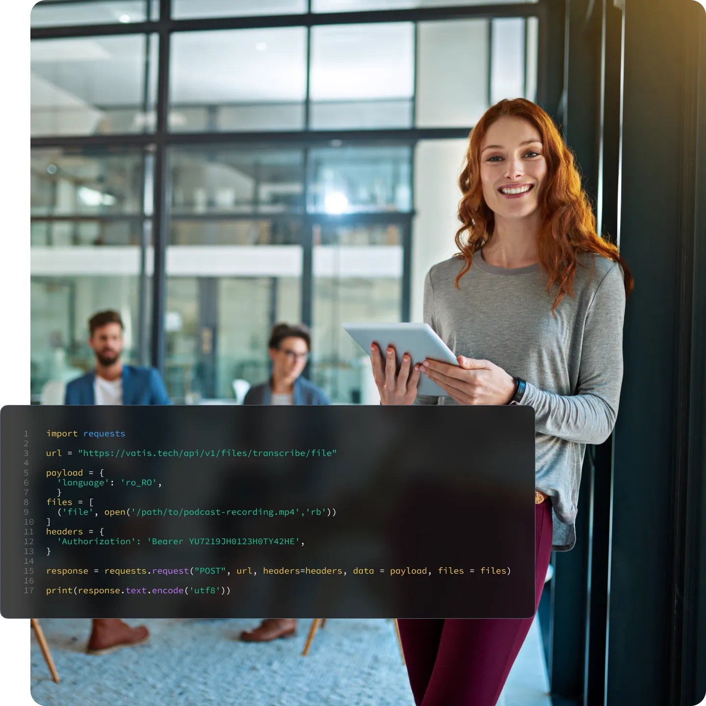A developer holding a tablet in an open-plan office, over a Python snippet posting a recording to the Vatis Tech transcription API