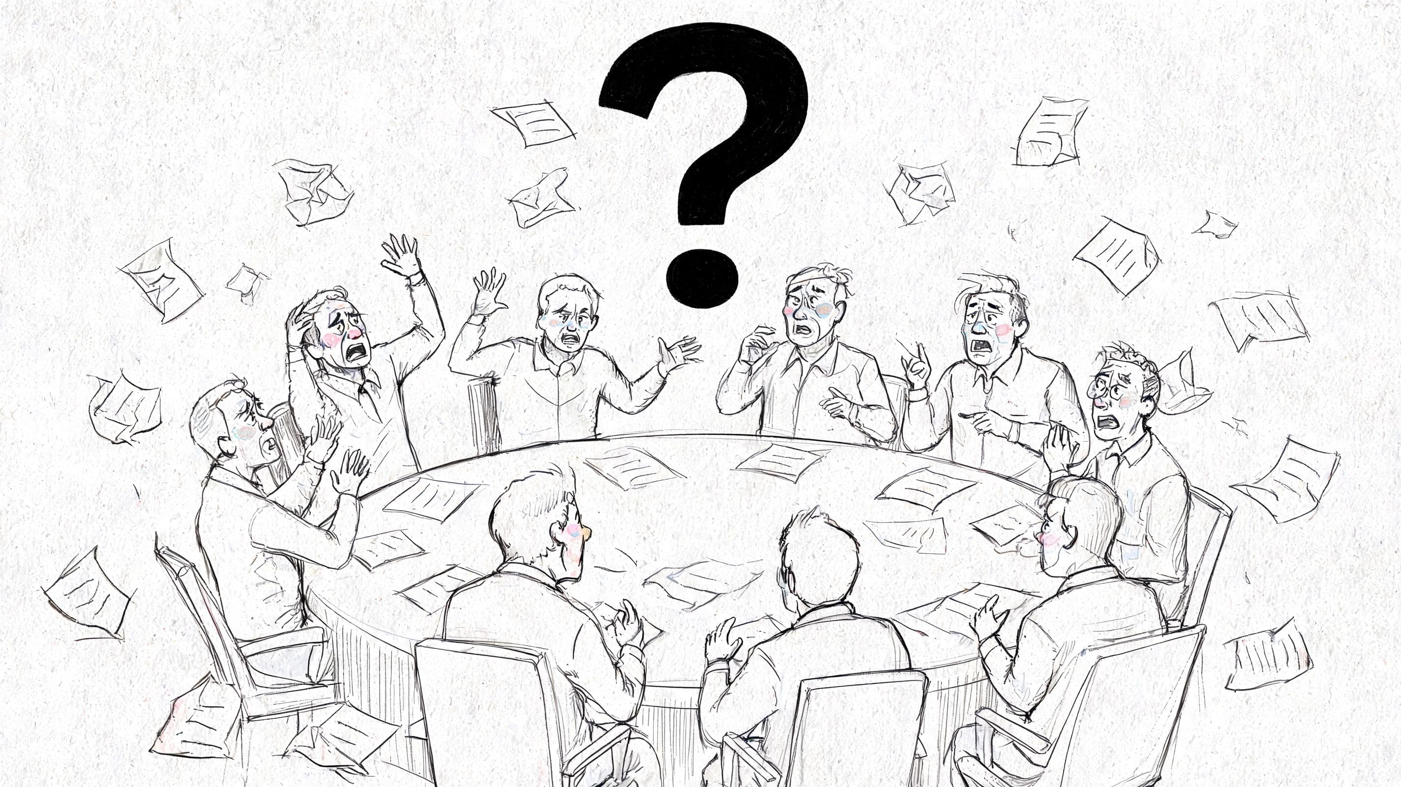 A group of stressed business people sitting around a round table filled with flying documents