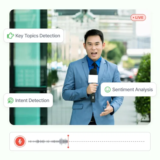 A reporter filing live from the street, with key topics detection, intent detection and sentiment analysis tagged over the recording's waveform