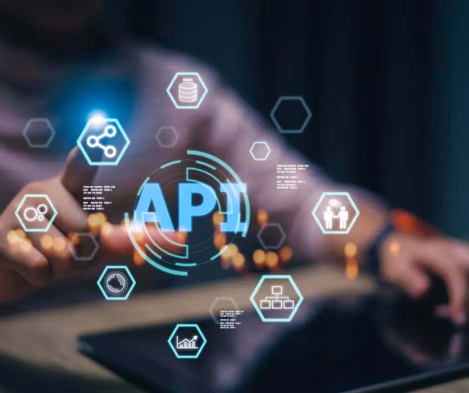 Hands using a tablet with a glowing "API" graphic and hexagonal tech icons above it